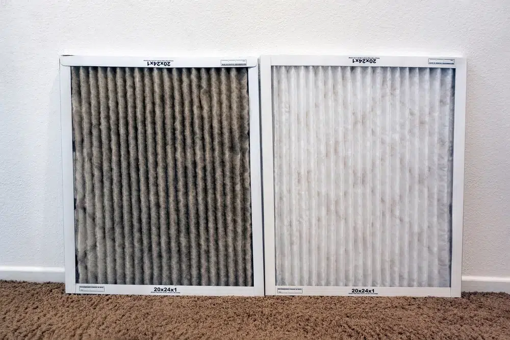 Dirty and clean HVAC air filters side by side — air quality maintenance service near Lake Gaston
